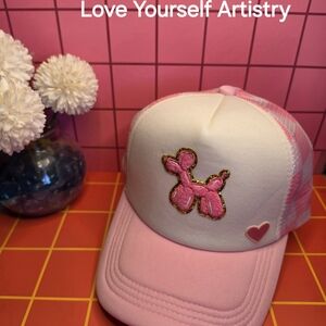 Pink and White Trucker Hat with Balloon Dog Design